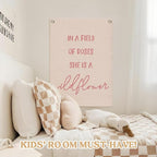 Nursery Decor,Girls Room Decor,Pink Linen Canvas Banner,In a Field Full of Roses She Is a Wildflower Nursery Decor Wall Hanging Flag for Playroom Bedroom Little Girl Room 18x25 Inch