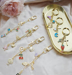 MORWLAT 358 PCS Gold DIY Keychain Making Kit Cute Bag Charm Kit 110 Charms 28 Keychain Clips with Key Ring Swivel Snap Hook Lobster Claw Clasps 200 Jump Ring Jewelry Plier DIY Set Women Craft (110)