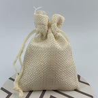 Palmhomee Pack of 25 Burlap Gift Bags with Drawstring Linen Jewelry Pouches Wedding Hessian Jute Bags for Birthday and Treat Pouches Party Wedding Favors Gift (2.8x3.6 Inch, Cream)